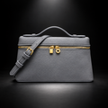 Gray handbag on a black spotlight background